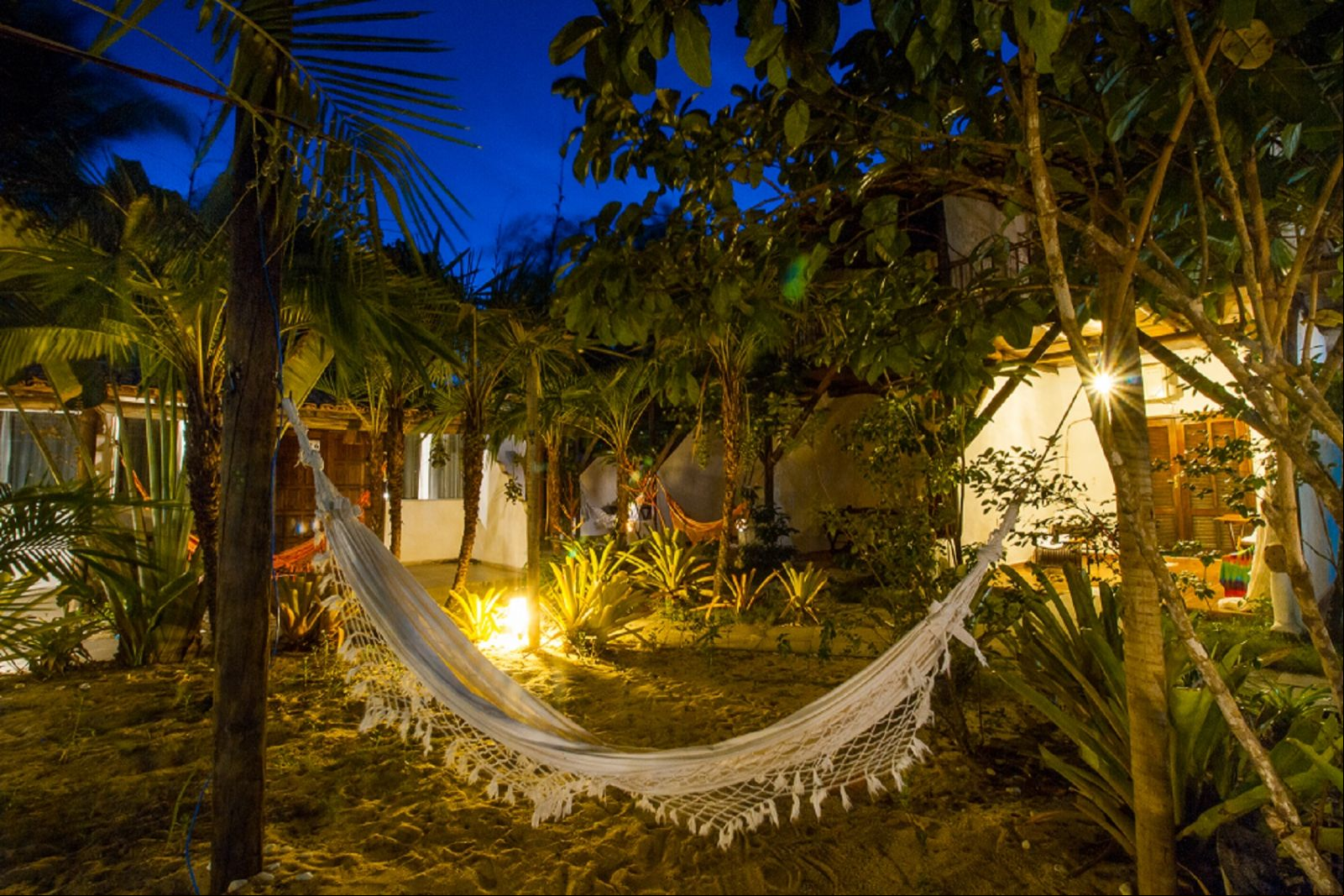 Foto: Divulgação/Travel Inn Trancoso chalés e habitações cercadas por jardins